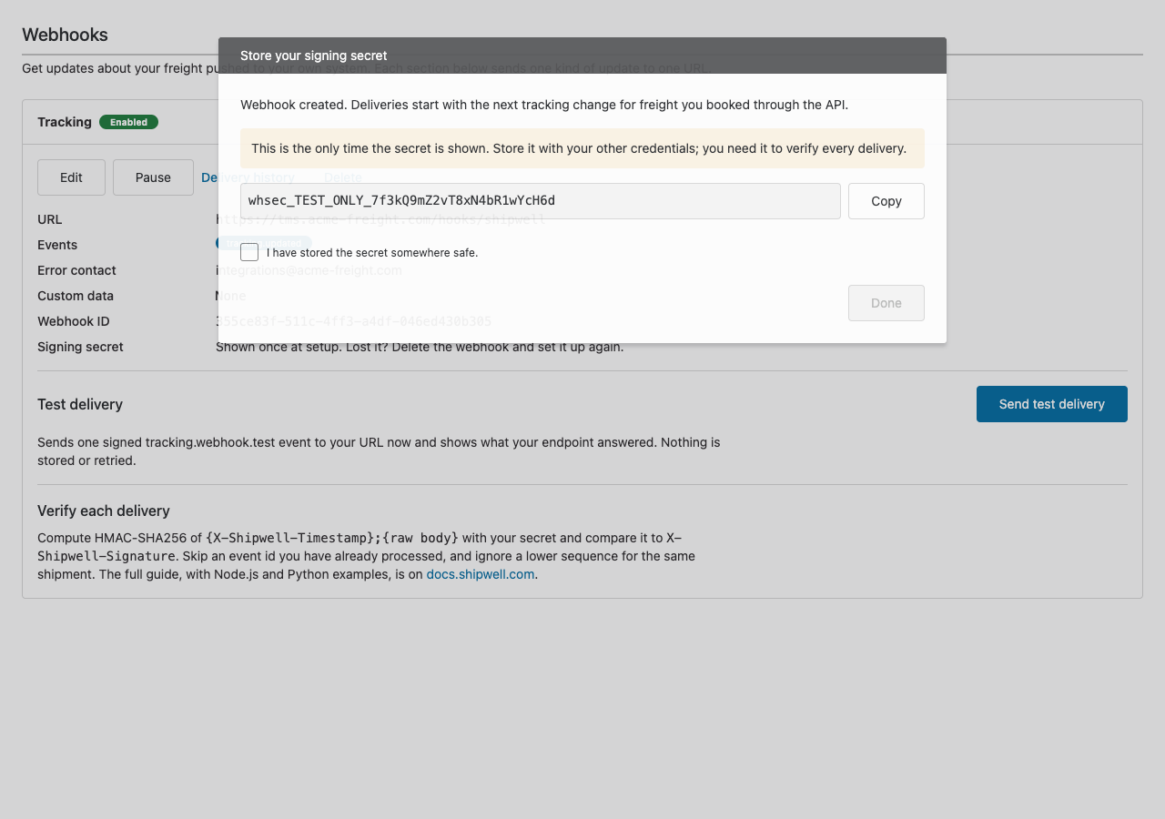 The signing secret dialog: the secret with a Copy button, a warning that it is shown only once, and a Done button that stays disabled until you confirm you've stored it